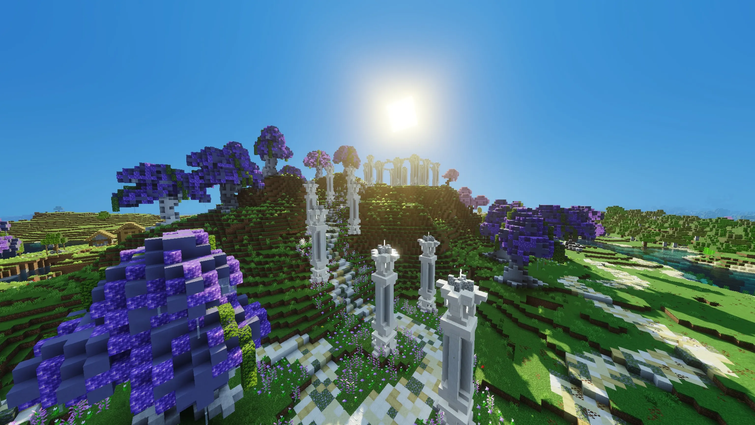 White marble ruins and purple blossom trees across the hills of Olympia